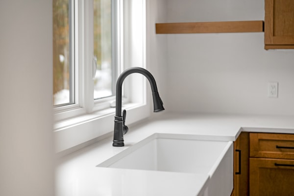Modern kitchen sink with chrome faucet